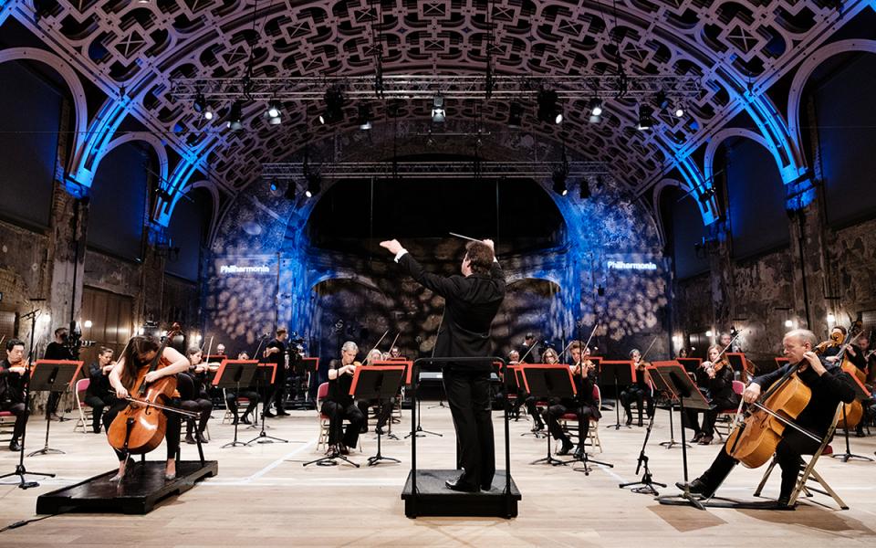 Conductor Jakub Hrusa conducts the Philharmonia a the Battersea Arts Centre in a socially distanced performance